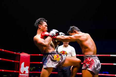 BANGKOK -FEBRUARY 6: Pechsiam K. with Vigo H. in Krudam Fight 4 on Muaythai Day at Asia Tique on February 6, 2016 in Bangkok, Thailand.のeditorial素材