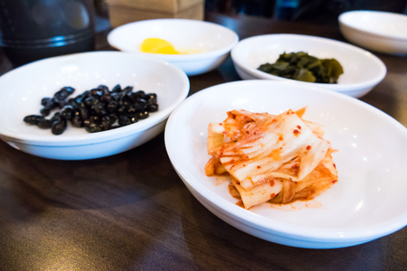 Kimchi, fermented Korean side dish made of vegetables with a variety of seasonings, traditional of Korean food.の写真素材