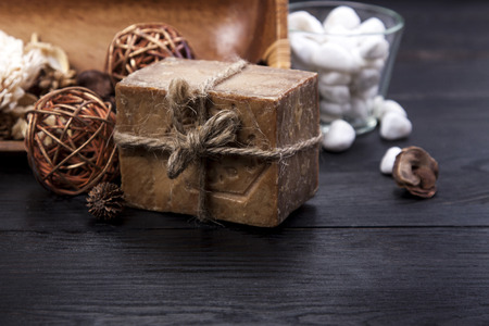 Cleaning products on wooden table. Soap, towel and moreの写真素材