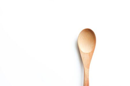 Wooden spoon on white backgroundの写真素材