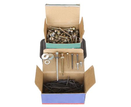 Screws, screws, etc. in packs, washers on the box lidの写真素材