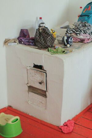 An old wood-burning stove in the house of a Kazakh farmerの写真素材