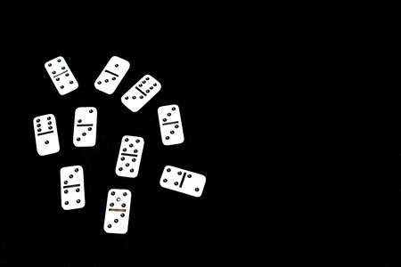 Dominoes on a black background.の写真素材