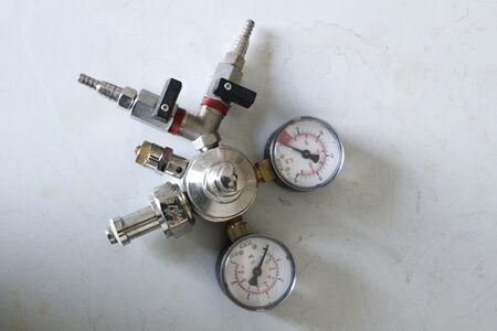 Gas reducer - a device for lowering the pressure of a gas or gas mixture at the outlet of a tank (for example, in a cylinder or gas pipeline)の写真素材