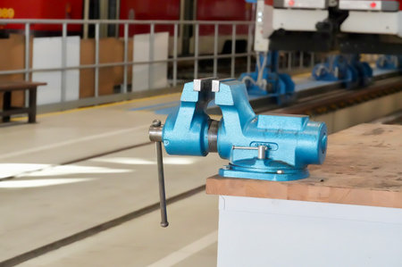 The image of a vise in a production workshop, closeup of photoの写真素材
