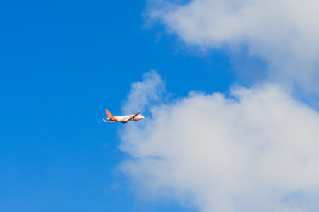 Airplane in the blue sky.の写真素材