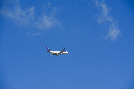 Airplane in the blue sky.