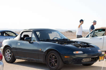 Cars on the race track and on the roads of the desertのeditorial素材