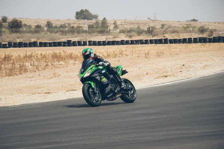 Motorcycle competition at a race track on a training dayのeditorial素材