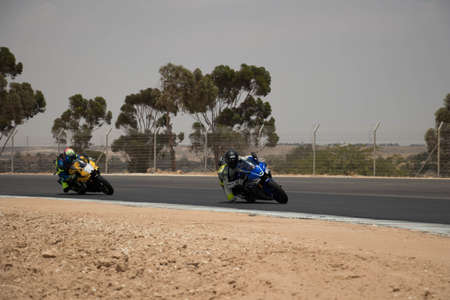 Motorcycle competition at a race track on a training day