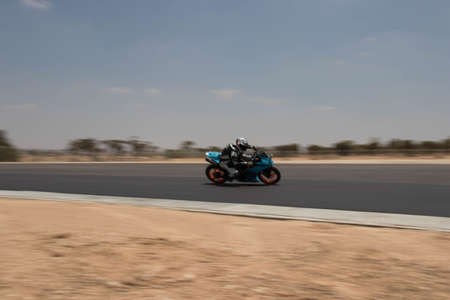 Motorcycle competition at a race track on a training dayのeditorial素材