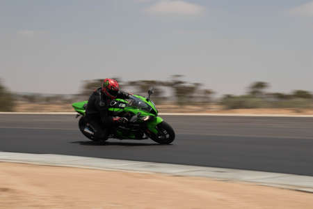 Motorcycle competition at a race track on a training day