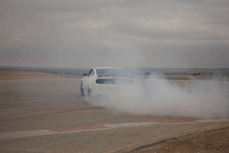 Cars on the race track and on the roads of the desert
