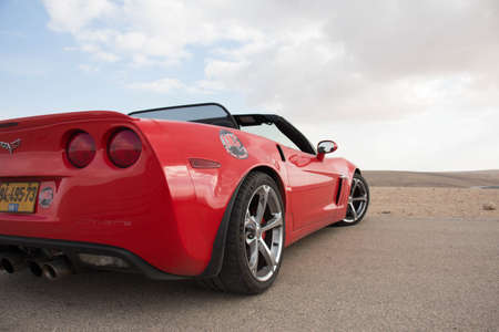 Cars on the race track and on the roads of the desert