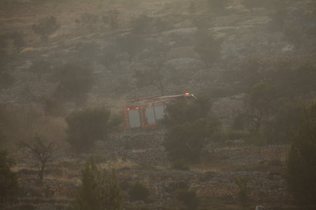smoke from a fire in the mountains, closeup of photo