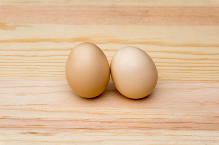 natural organic eggs on wood