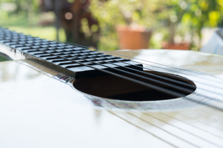 Wooden guitar background with space for your textの写真素材