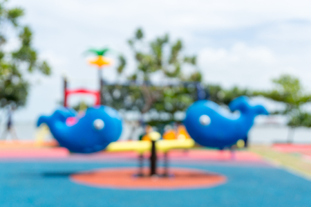 Blur of Colorful playground on yard in the park.の写真素材