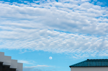 The moon and sky with cloudの写真素材