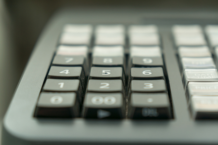 Soft focus Of Cash Register With Printed Receiptの写真素材