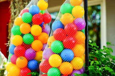colorful ball in Mesh bag hangingの写真素材