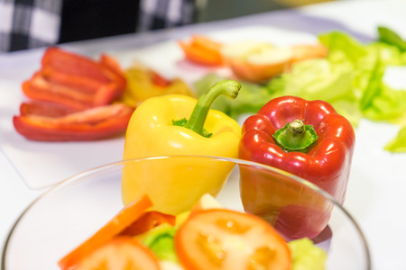 salad with vegetables and greens in on table