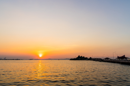 Silhouette of Koh loy with sunset in Sriracha Chonburi, Thailandの写真素材