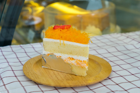 Gold Egg Yolk Thread Cakes on wooden plate