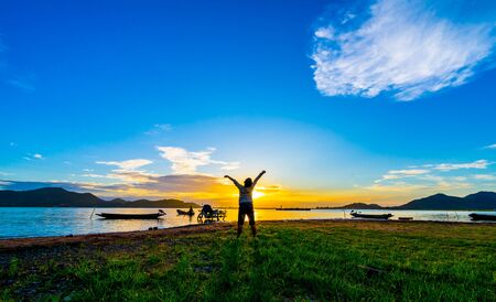 Happy Child boy with sunset at Bang Phra Reservoir, Bang Phra, Si Racha District, Chon Bur