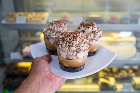 Banoffee cake cup  on hand in shop