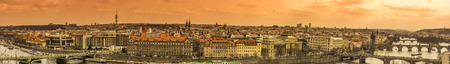 Prague city panoramic view - Panoramic city view with the capital of Czech Republic, Prague, with details of the  historical buildings and the many stone bridgesの写真素材