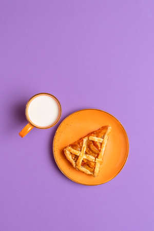 Waffle with peach filled and green color backgroundの写真素材