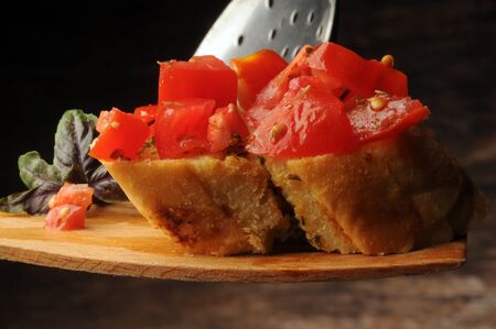 Bruschetta with garlic and tomatoの写真素材