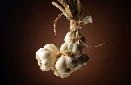 Close up of a garlic braidの写真素材