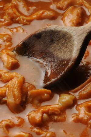 Close up of the preparation of parmesan tripes
