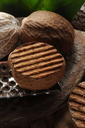 Close up of nutmegs with graterの写真素材