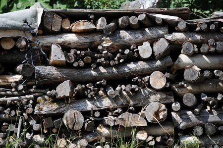 Background of a pile of firewood