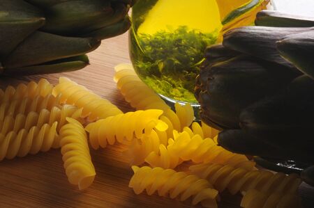 Fusilli with artichokes and flavored olive oilの写真素材