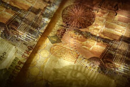 Closeup of the Egyptian currency in transparencyの写真素材