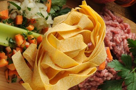 Pappardelle with ingredients to prepare the sauce.の写真素材