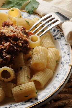 Plate of half sleeves with meat sauceの写真素材