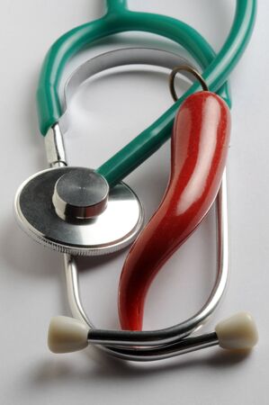 Close up of stethoscope and amuletの写真素材