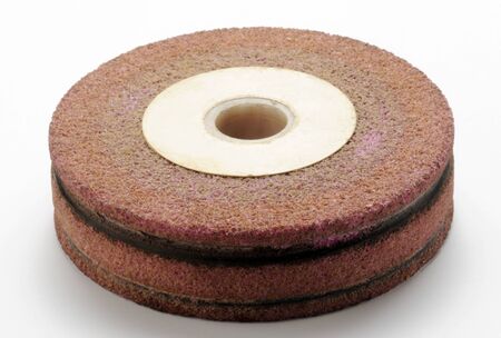 Wheel of a grinder on the white backgroundの写真素材