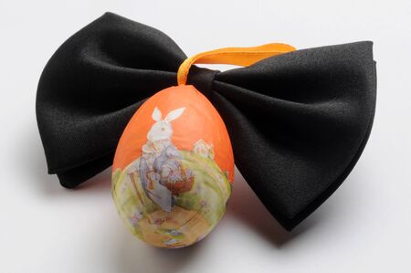 Black bow tie with easter eggの写真素材
