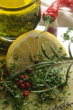 Herbs with olive oil and spicesの写真素材