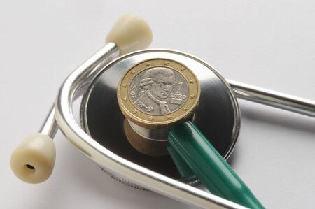 Austrian one euro coin on stethoscopeの写真素材
