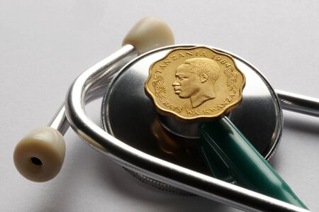 Close up of a Tanzanian coin on a stethoscopeの写真素材