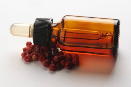 Bottle of red peppercorn concentrateの写真素材