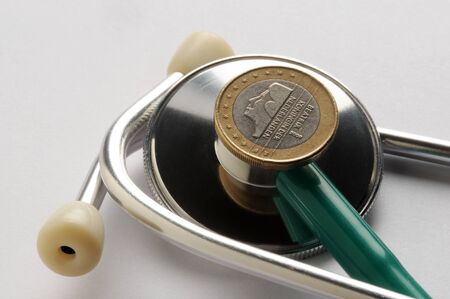 One dutch euro coin on stethoscopeの写真素材