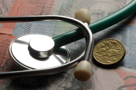 Stethoscope on Australian banknotes and coinsの写真素材